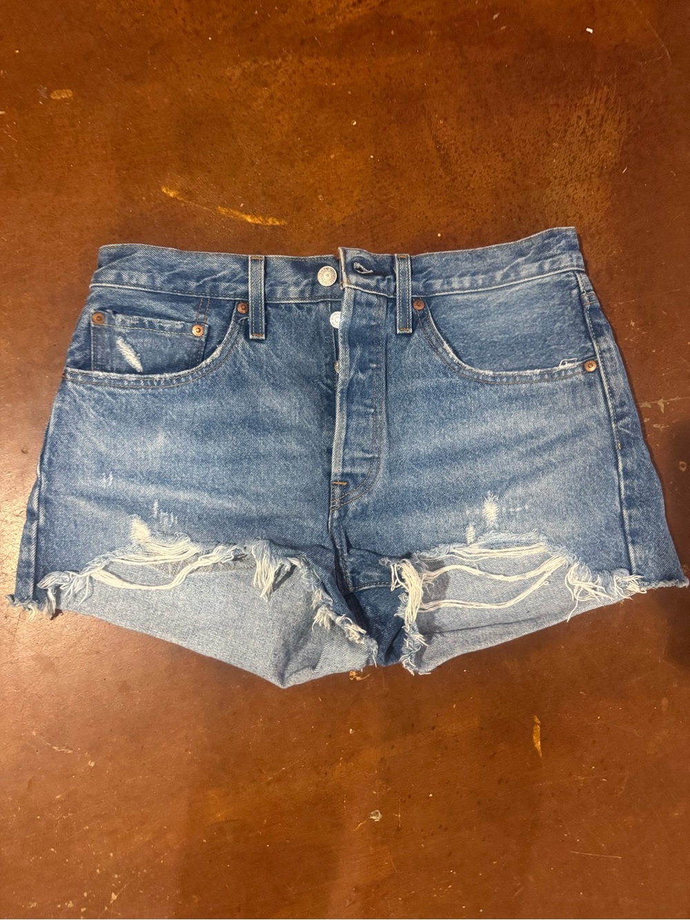 Levi's Medium Blue Distressed Cutoff Denim Shorts